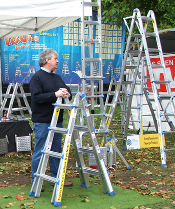  A Flower Show stall-holder looks for customers. 