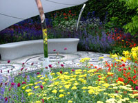 stone-garden-bench-flowers